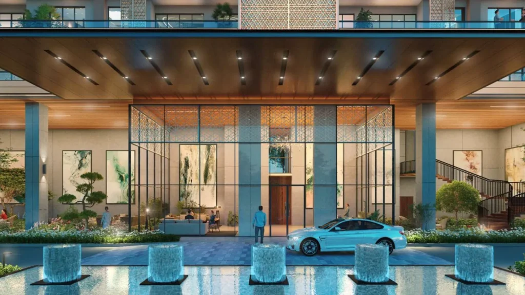 Double-height entrance lobby with water fountains at Puri Diplomatic Residences