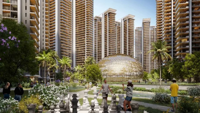 Central landscaped garden with life-size chess board and towers at Elan The Emperor