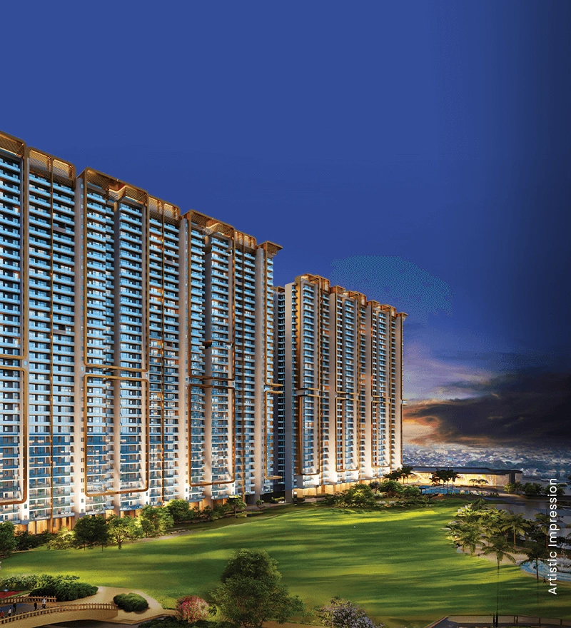 M3M Mansion high-rise towers and golf greens at dusk