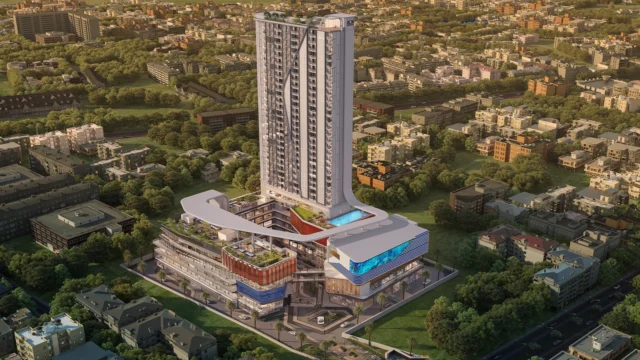 Aerial view of SPJ Vedatam’s full mixed-use complex with serviced apartment tower and commercial block in Sector 14 Gurgaon
