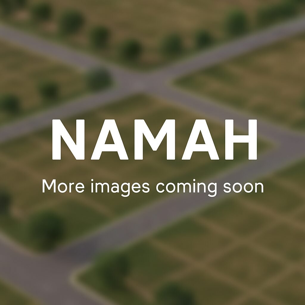 NAMAH project image placeholder with blurred aerial view of plotted land and text reading ‘More images coming soon’.